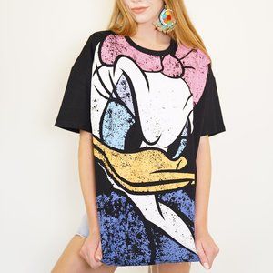 ظلم زميل مرئي daisy duck shirt zara 